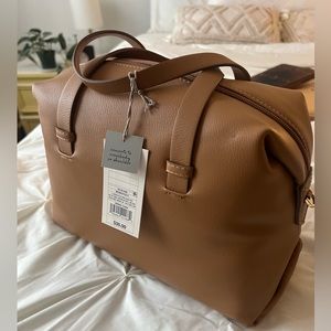 Brand new brown/tan purse from Target brand a new day! Converts to crossbody!